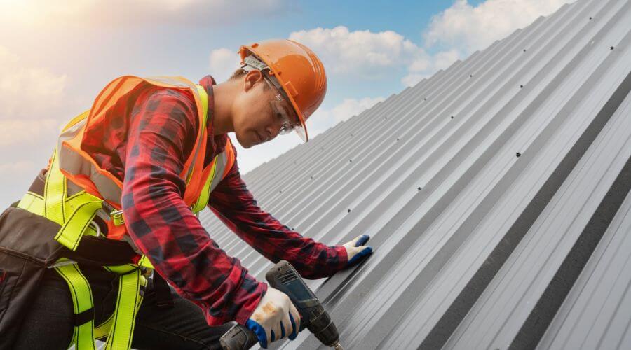 Expert tile roof repair services in Warfield, KY